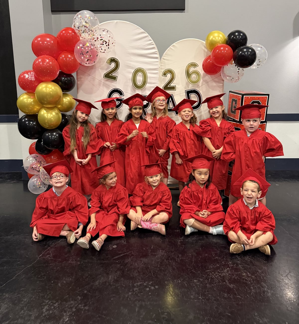 pre-k graduation caps gowns preschool pre-kindergarten Four Points Austin childcare West Austin Jester