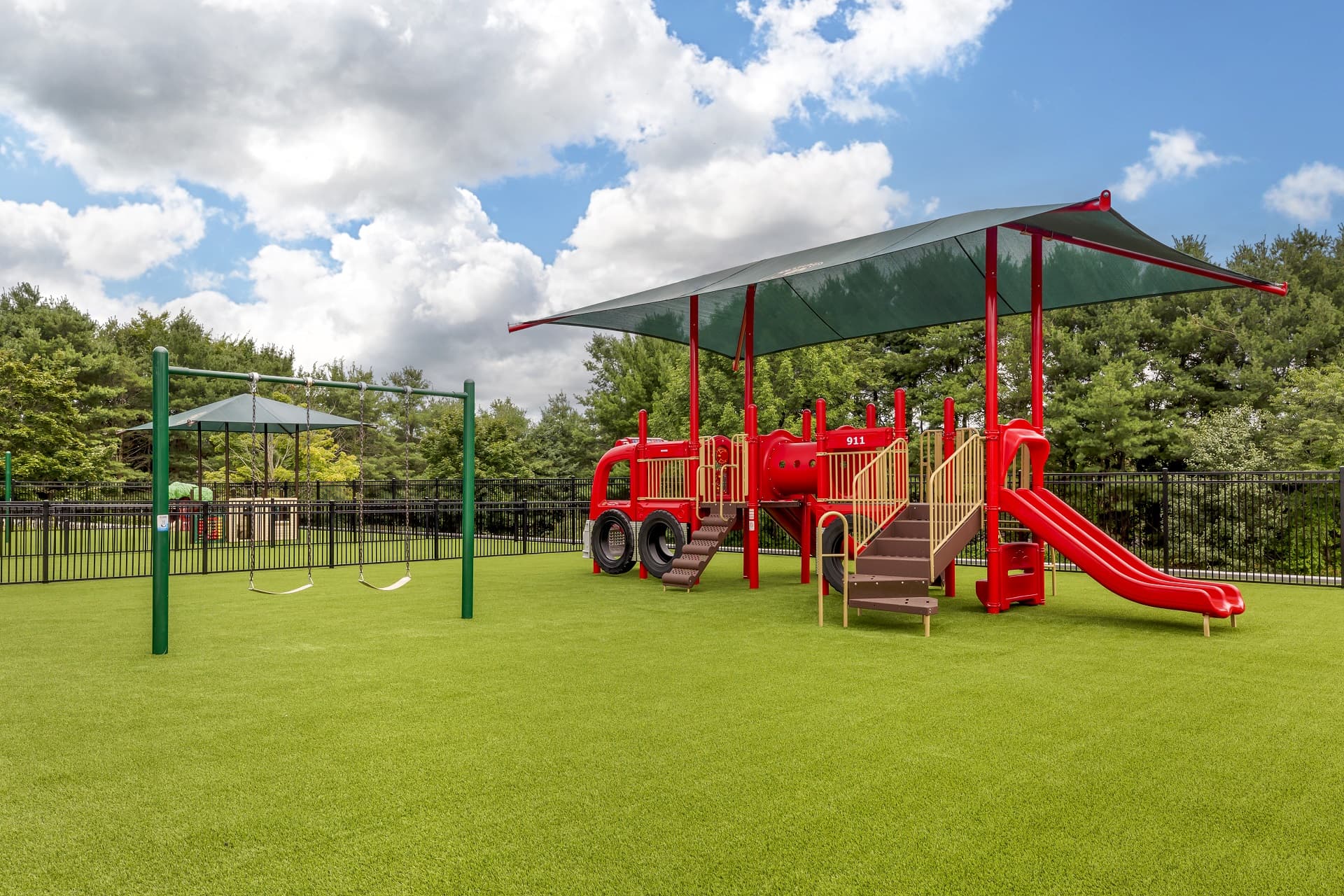 Playground with red jungle gym