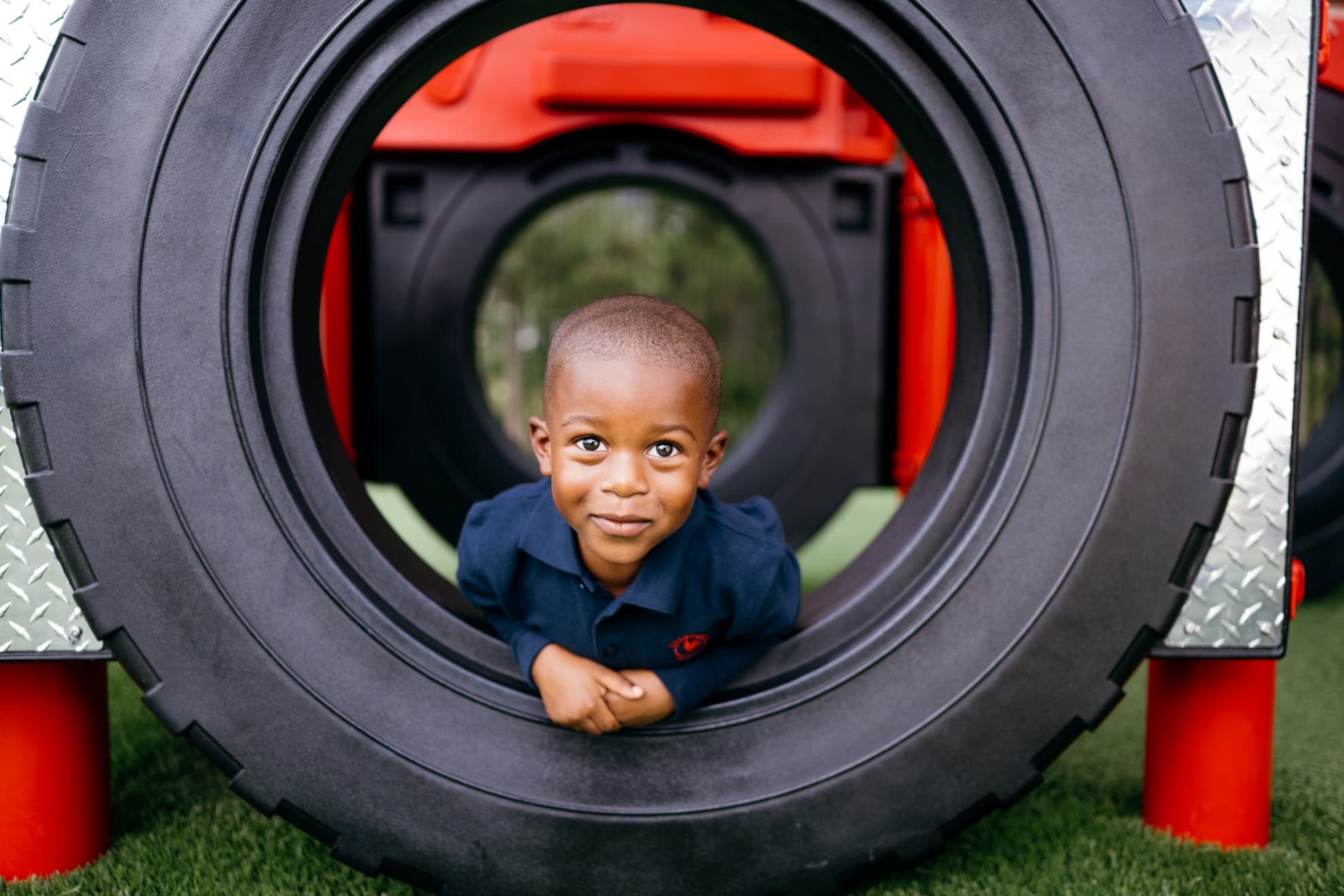 Little boy playing at recess