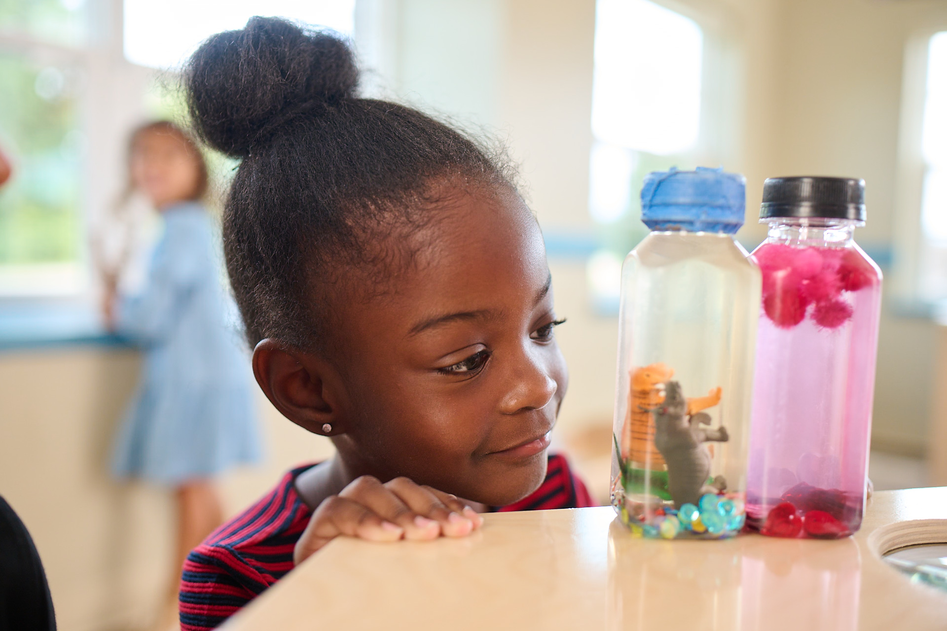 preschool student doing a stem activity