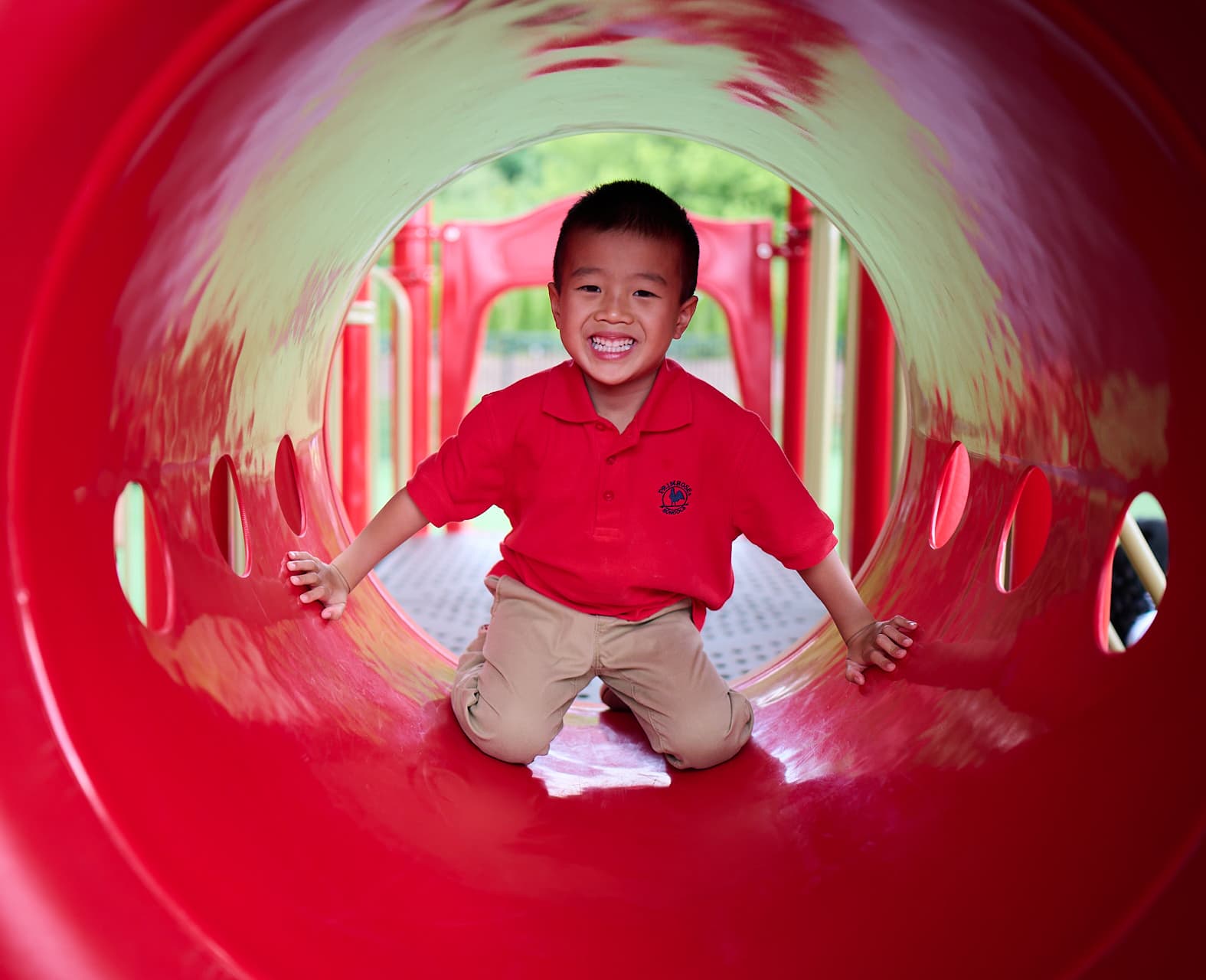 pre-k student play on jungle gym