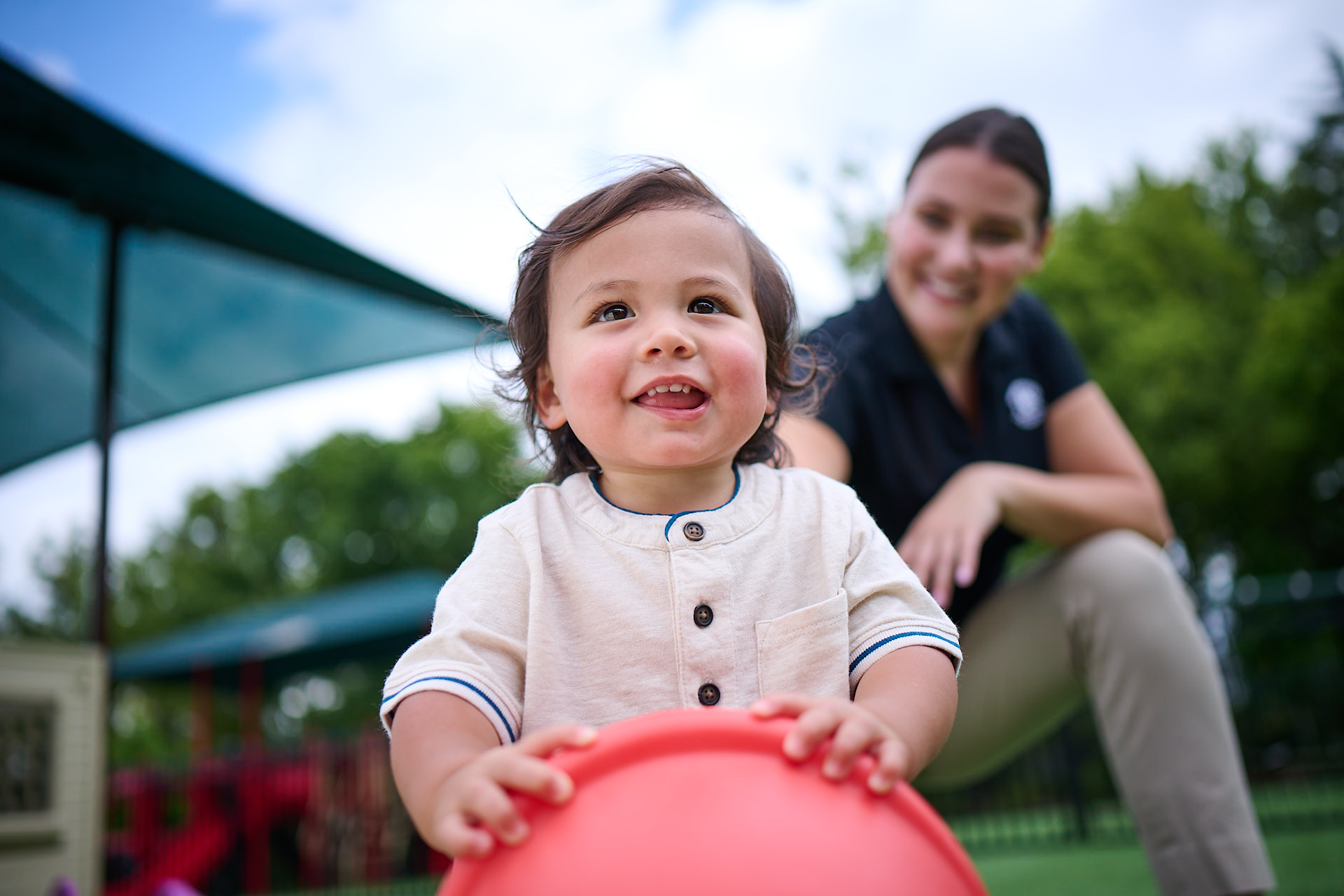 toddler playing on the playground