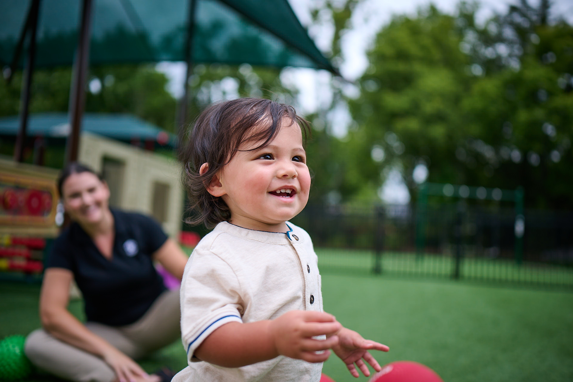 child running on playground