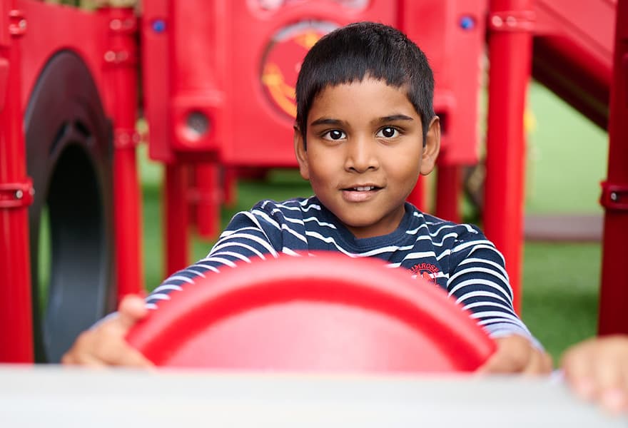 primrose student playing on the playgroud