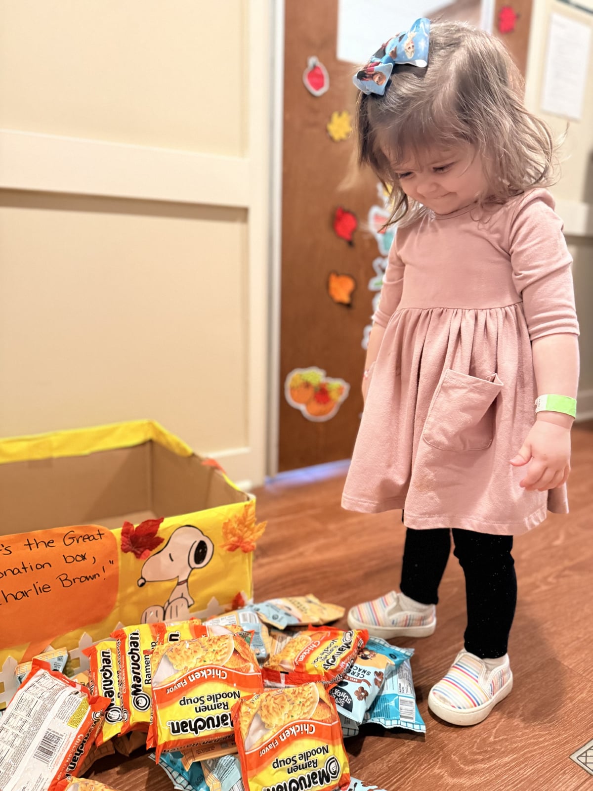 Child smiling at donations