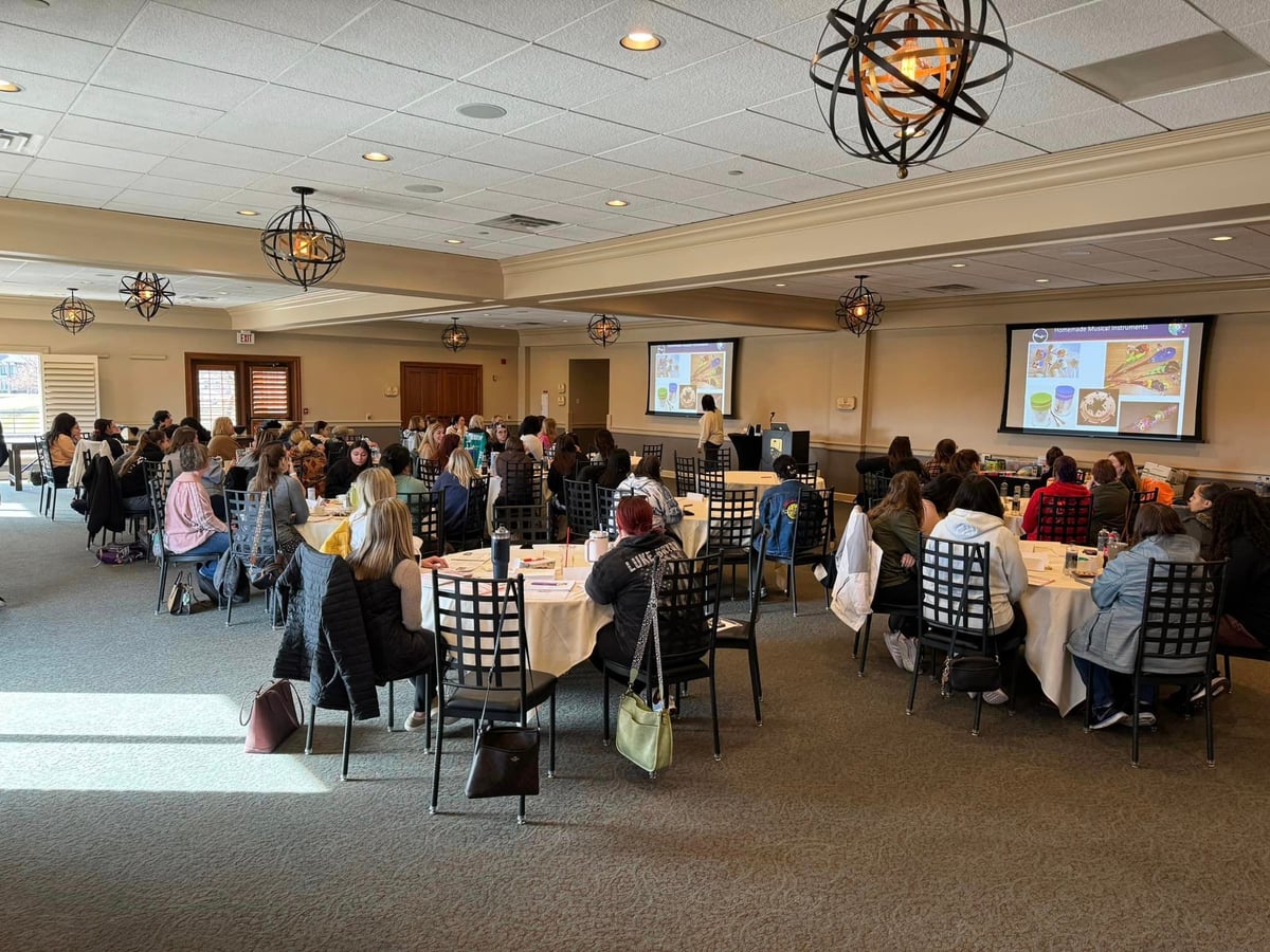 Staff taking an Early Learning Guideline course at Staff Development Day, with presenter Willie Bob Johnson.