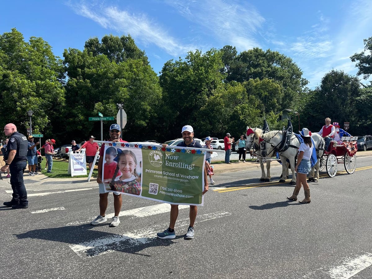 Primrose daycare walking downtown waxhaw parade