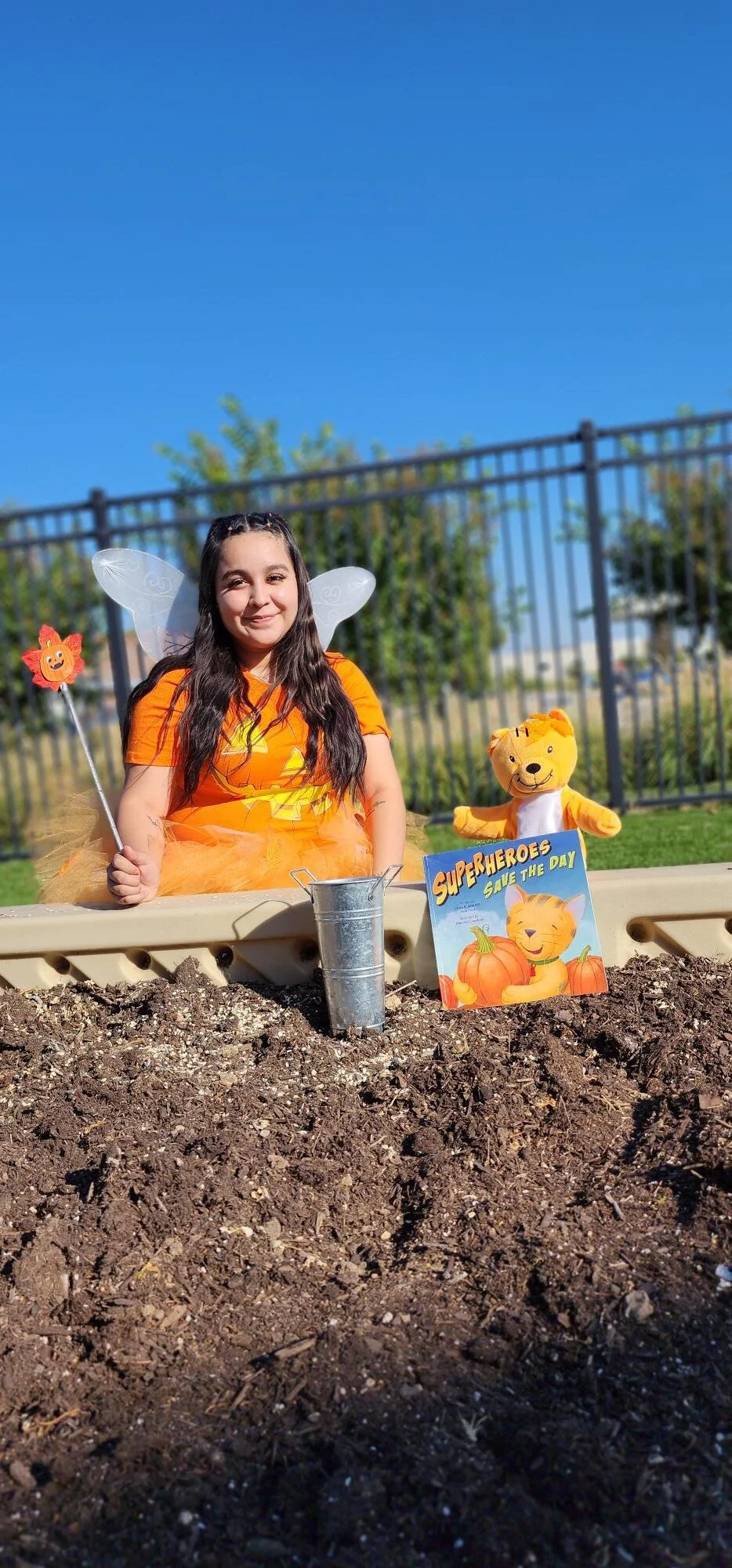 Pumpkin fairy visiting daycare for a fun early learning activity about imagination and magic