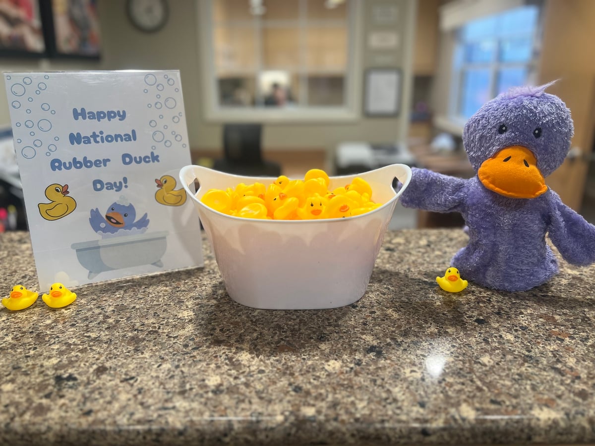 Primrose School students celebrating National Rubber Duck Day with rubber ducks