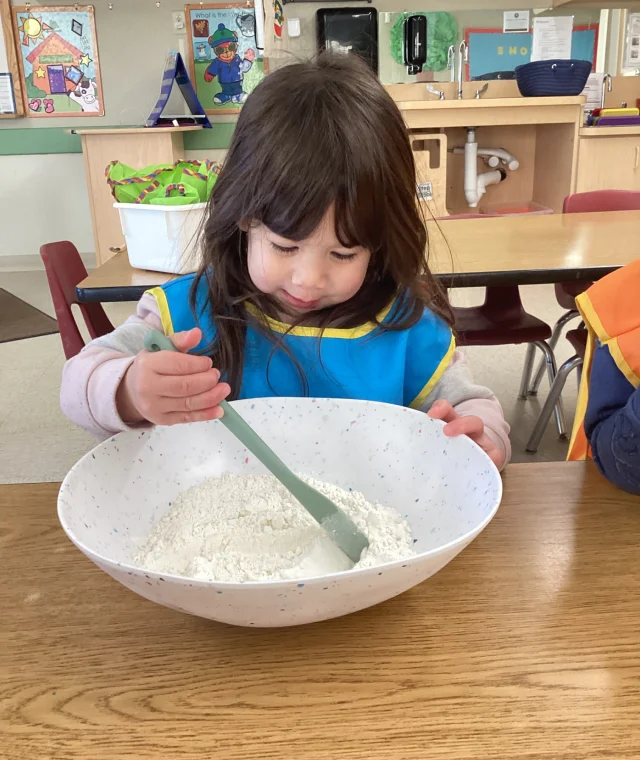 Measuring, pouring, and mixing ingredients!