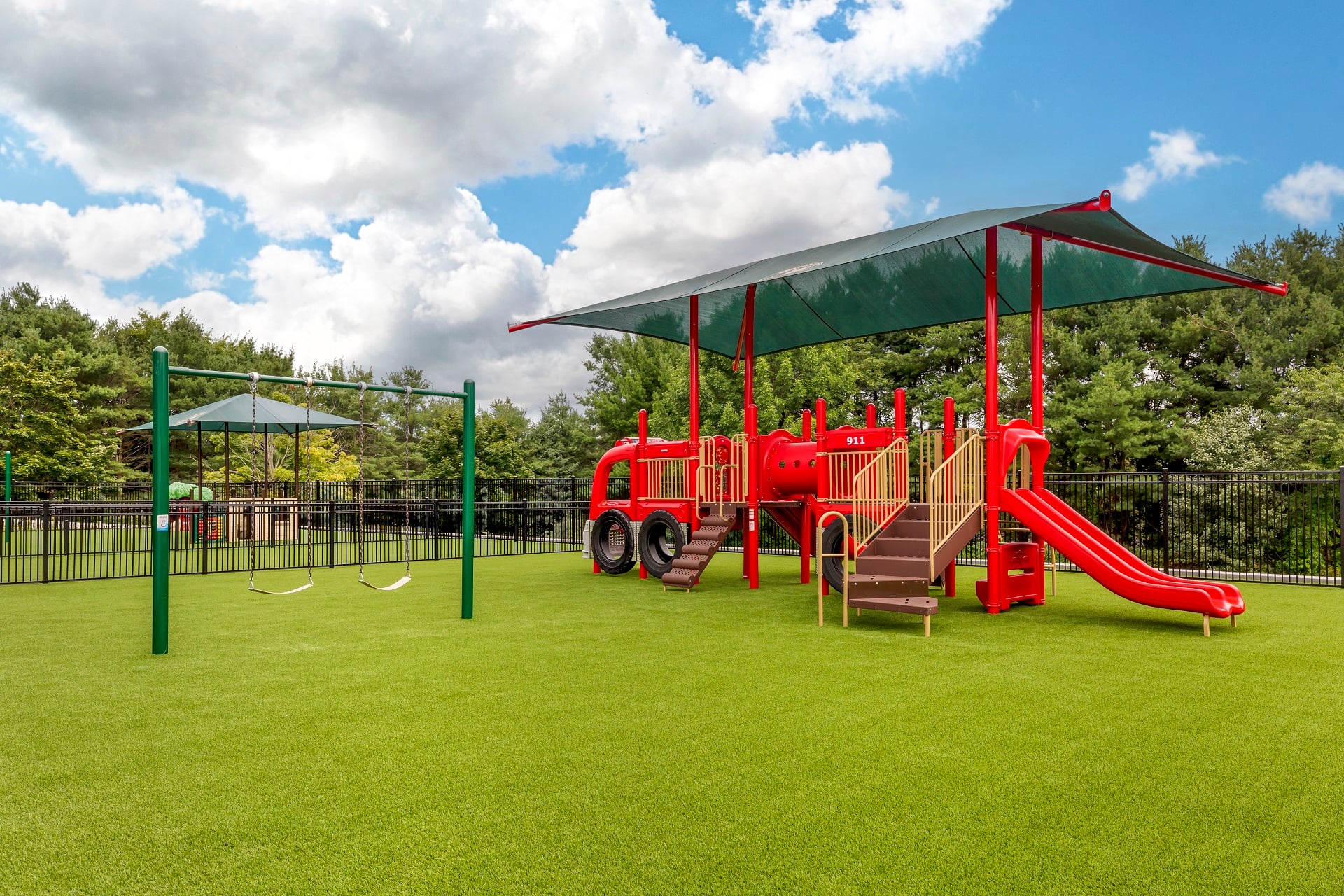 Playground with red jungle gym