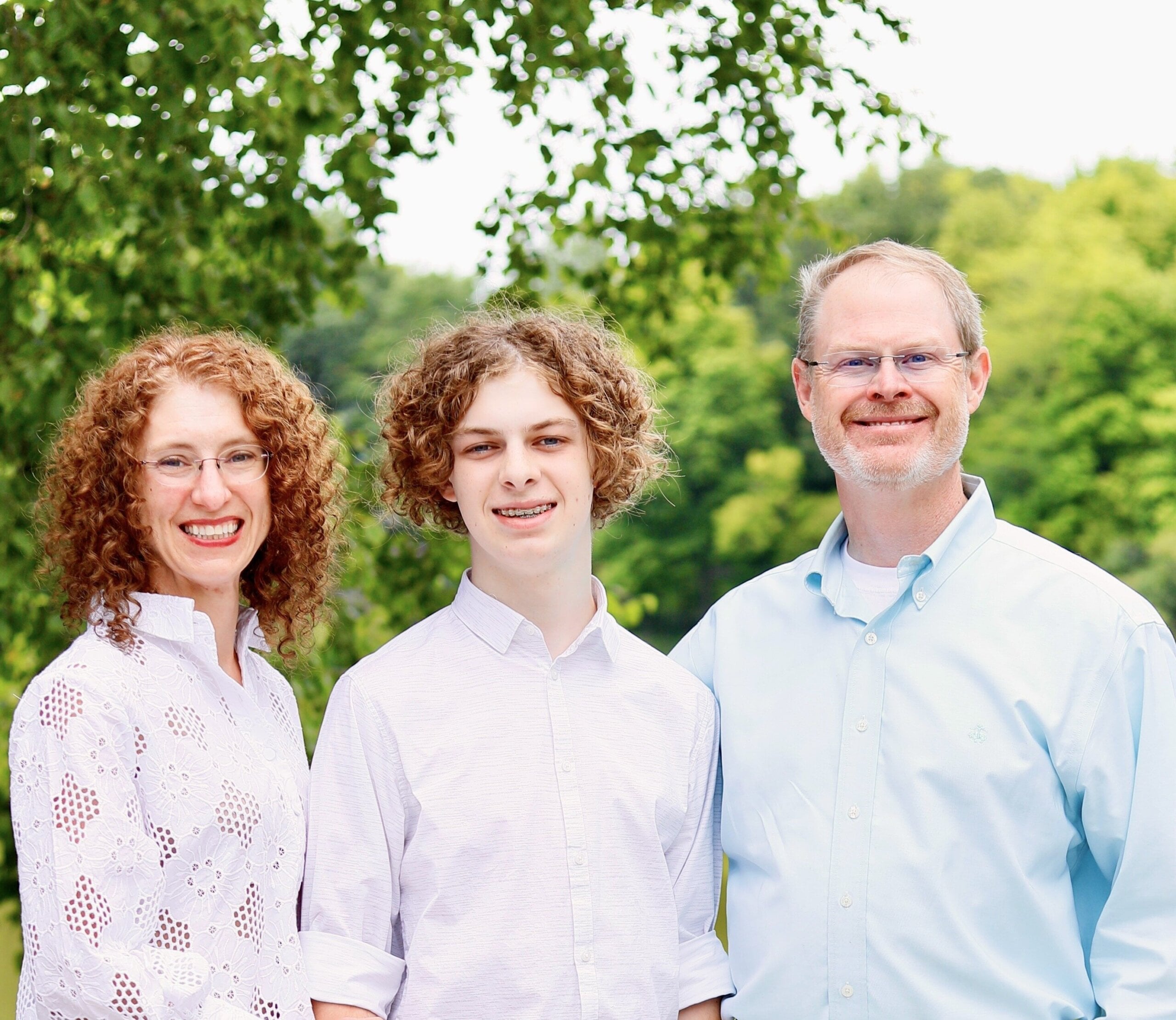 Primrose School of Eden Prairie franchise owners posing with their child