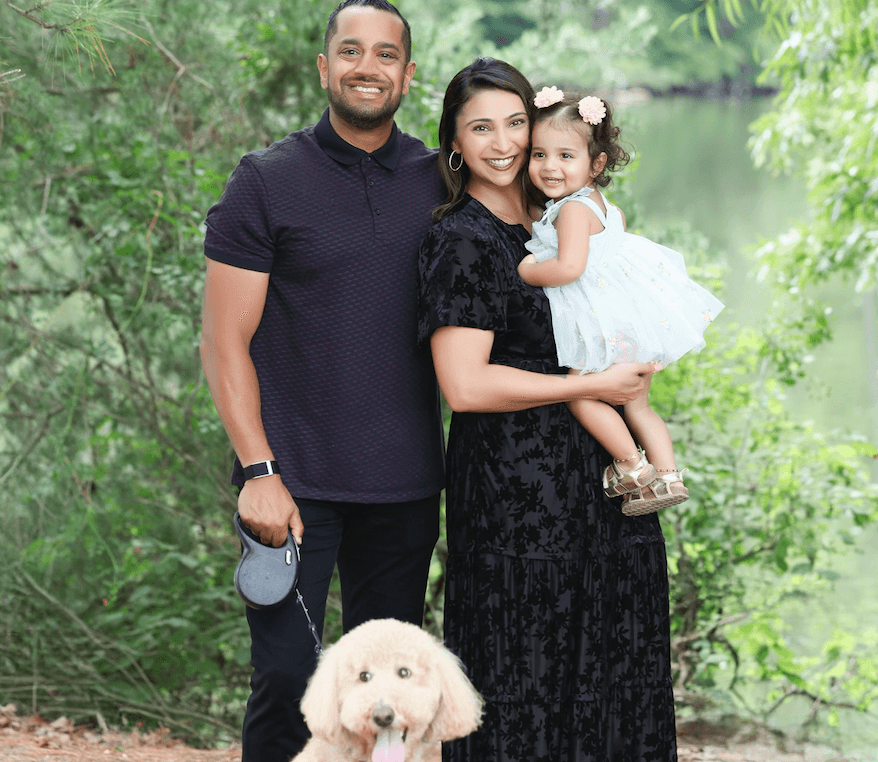 Nirav and Nina Patel Franchise Owners of Primrose School of Greenbrier with their goldendoodle and daughter